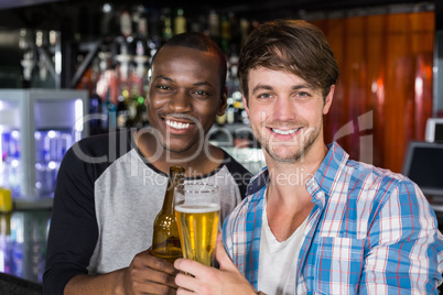 Happy friends having a drink