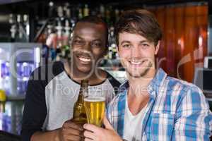 Happy friends having a drink