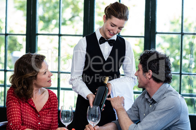 Couple selecting a bottle of wine