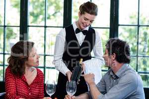 Couple selecting a bottle of wine