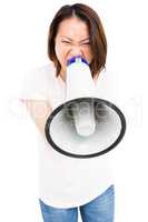 Young woman shouting on horn loudspeaker