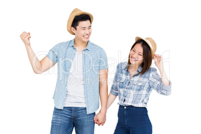 Young couple holding hands