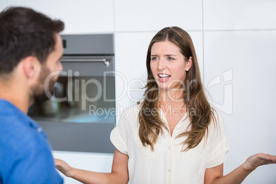 Young woman explaining husband