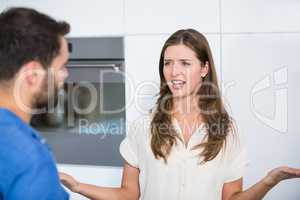 Young woman explaining husband