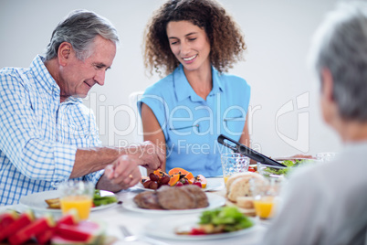 Father and daughter having breakfast together Father and daughter having breakfast together