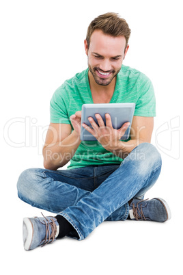 Young man using digital tablet