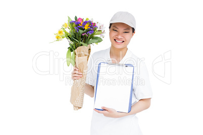 Delivery woman with bouquet and clipboard