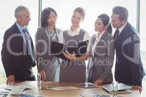 Businesswoman looking at organizer