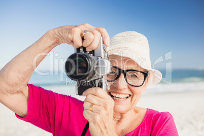 Senior woman taking picture