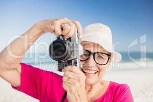 Senior woman taking picture