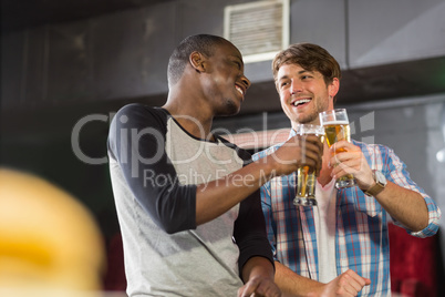 Happy friends having a drink