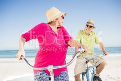 Senior couple going for a bike ride