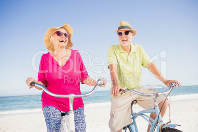 Senior couple going for a bike ride