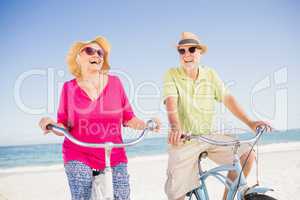 Senior couple going for a bike ride