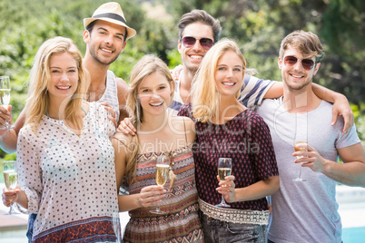 Portrait of friends with glasses of champagne