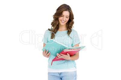 Young woman reading books