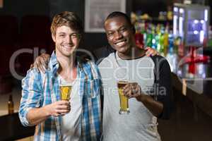 Happy friends having a drink