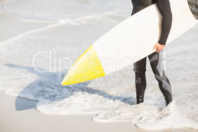 Surfers feet on the beach