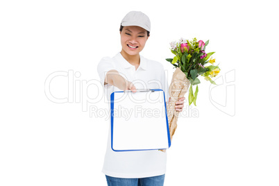 Delivery woman with bouquet and clipboard