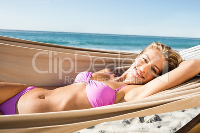 Woman lying in hammock