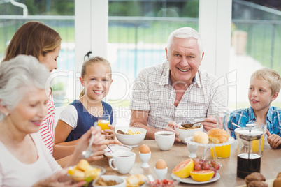 Family having breakfast at table