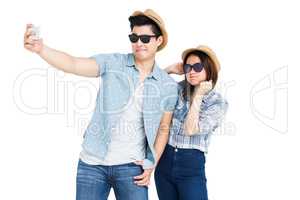 Happy young couple taking a selfie