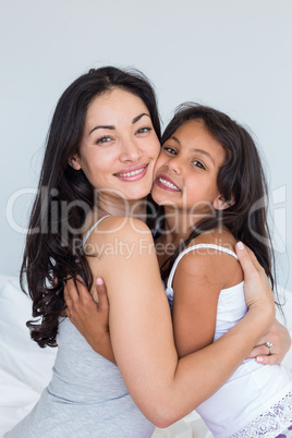 Woman relaxing with her daughter