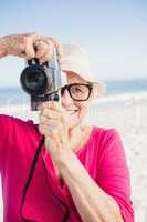 Senior woman taking picture