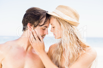 Young couple romancing on the beach