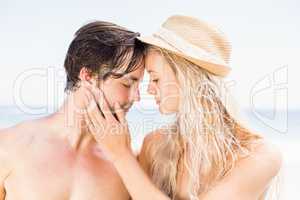 Young couple romancing on the beach