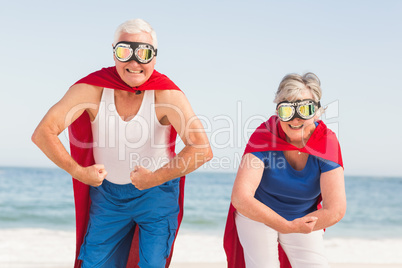 Senior couple wearing superman costume