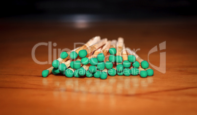 Matches with green head