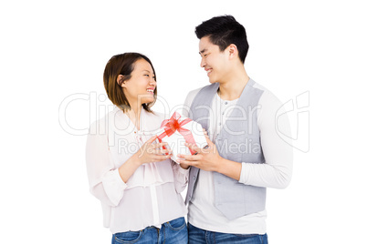 Young man giving a present to woman