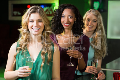 Portrait of friends drinking champagne