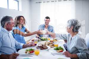 Happy family having breakfast together