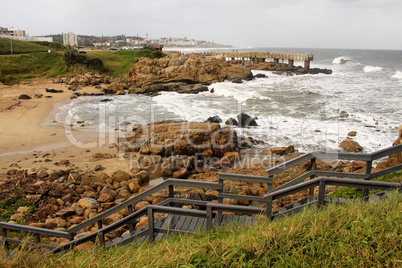 Coastal Town Wooden Steps and Concrete Jetty in Storm