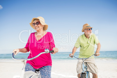 Senior couple going for a bike ride