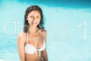 Portrait of beautiful woman in swimming pool