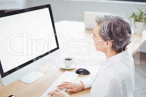 Businesswoman using computer