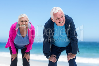 Mature couple tired after running