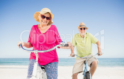 Senior couple going for a bike ride