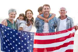Happy family with an american flag