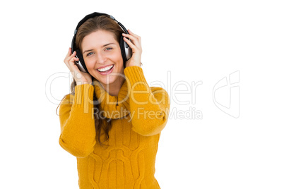 Woman listening to music on headphones