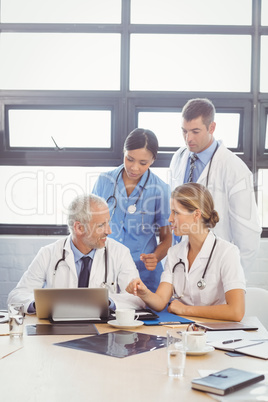 Medical team interacting in conference room