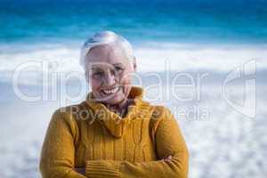 Senior woman posing with crossed arms