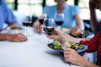 Friends having lunch in restaurant