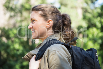 Smiling woman with backpack