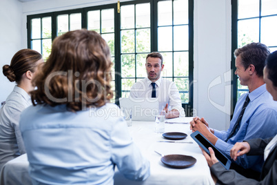 Businessman talking in a business meeting