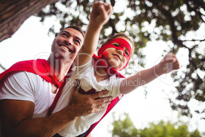 Father and daughter pretending to be a superhero