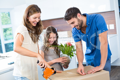 Happy family packing box